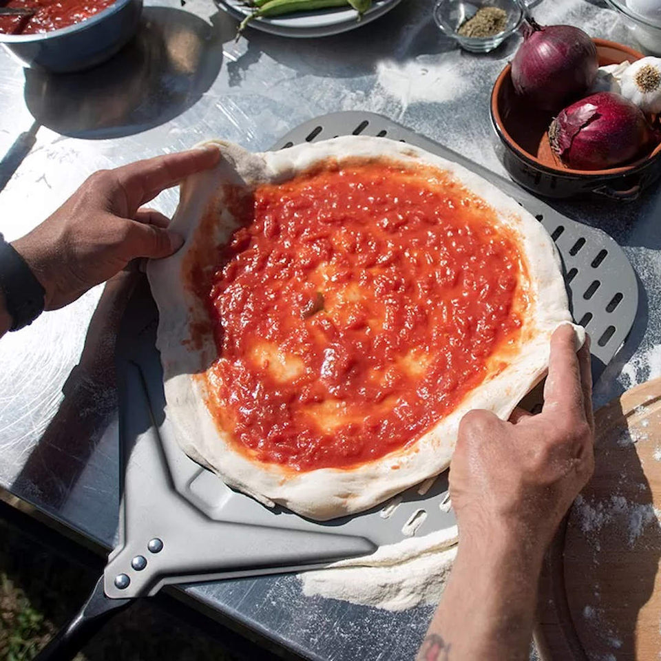 Alfa Pizza Oven Tool Kit Large prepping the pizza on a large peel