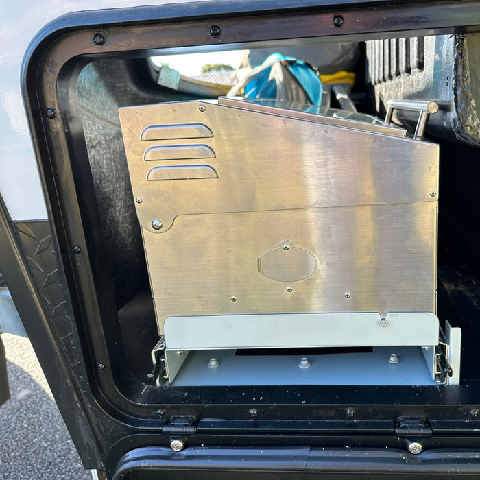 Caravan BBQ on slide used inside a caravan tunnel boot space