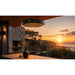 Herschel Ibiza Zero-Light Outdoor Infrared Heater with LED Lighting over a table in an outdoor area