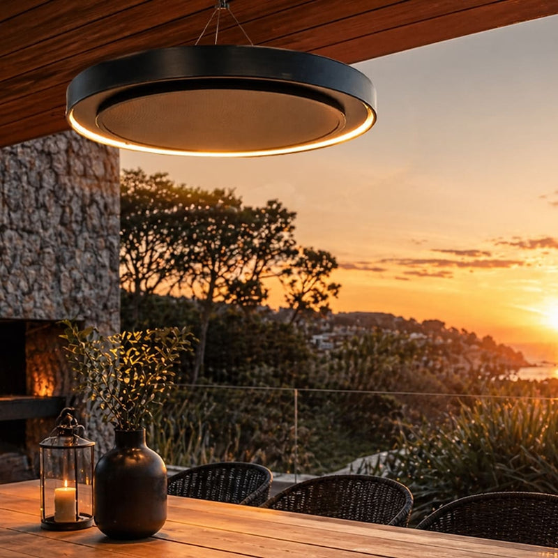 Herschel Ibiza Zero-Light Outdoor Infrared Heater with LED Lighting over an outdoor table