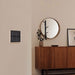 Herschel Touch Screen Control Centre – Smart Life Whole-Home Heating Control sitting in a lounge room