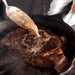 3 Piece Cast Iron Pan Set | BBQ & Camping with a large steak cooking