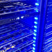 Door Dual Zone Drawer Wine And Beverage Refrigerator | BD425D-X-B showing the internal blue LED lgihts