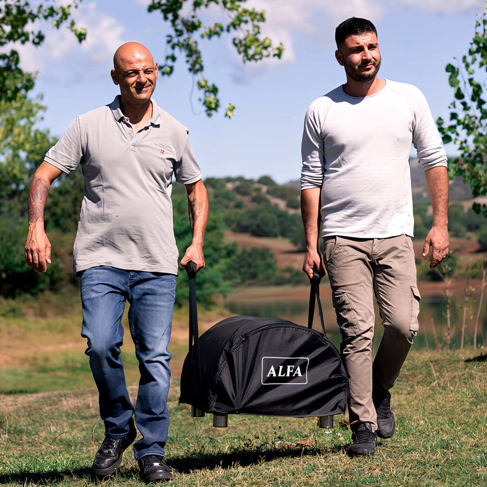 Pizza Oven Cover Alfa Forni two men carrying portable pizza oven