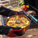 Heat Resistant Gloves | For Outdoor Cooking showing the red version in use