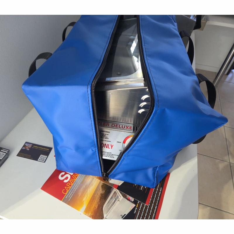 Carry Bag & Cover for Sizzler Deluxe and Galleymate 1100 BBQ Range showing the unit inside the sizzler deluxe bag in blue