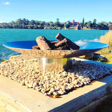 Fire Pit: The Cauldron Hearth stainless steel side view near ocean